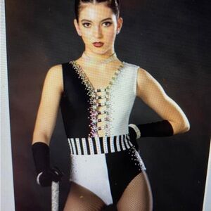 Black and white xs adult glamour costume. Gems throughout. Long gloves.